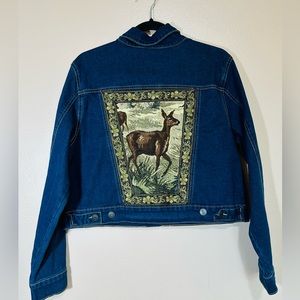 Upcycled denim jacket.
Vintage tapestry adorned jacket. Wildlife deer
